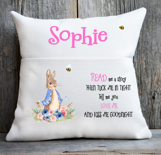 blue rabbit book cushion