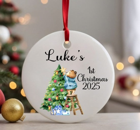 Decorative Christmas ornament with a teddy bear and tree, personalised for 'Luke's 1st Christmas 2025'.