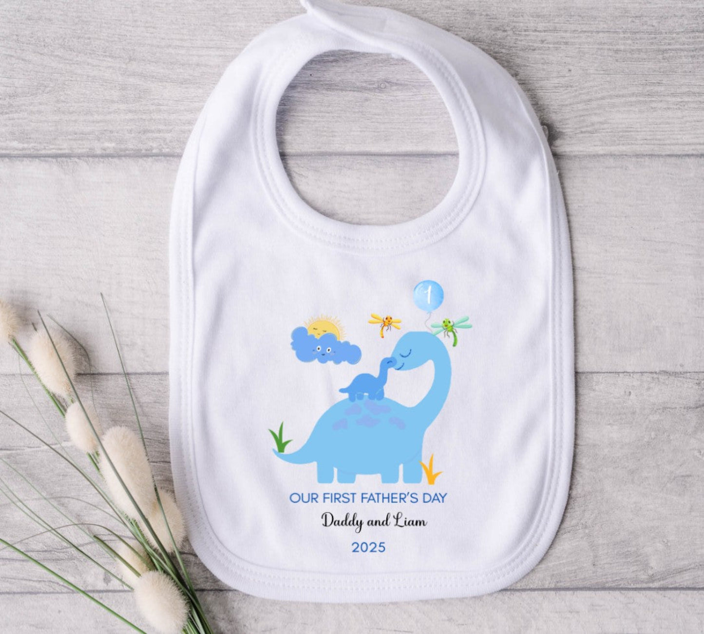 blue dinosaur bib