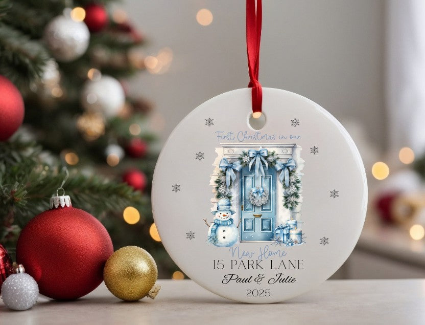 Personalised Christmas ornament with festive design and blurred Christmas tree in the background