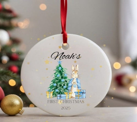 Decorative Christmas ornament with a rabbit and tree design, personalised for 'Noah's First Christmas 2025'.