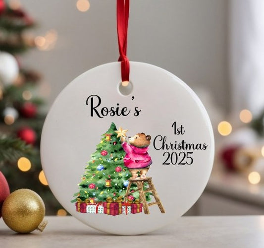 Personalied Christmas ornament with a teddy bear and tree, featuring 'Rosie's 1st Christmas 2025'.