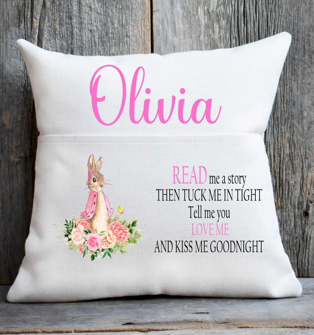 Decorative pillow with a bunny illustration and text