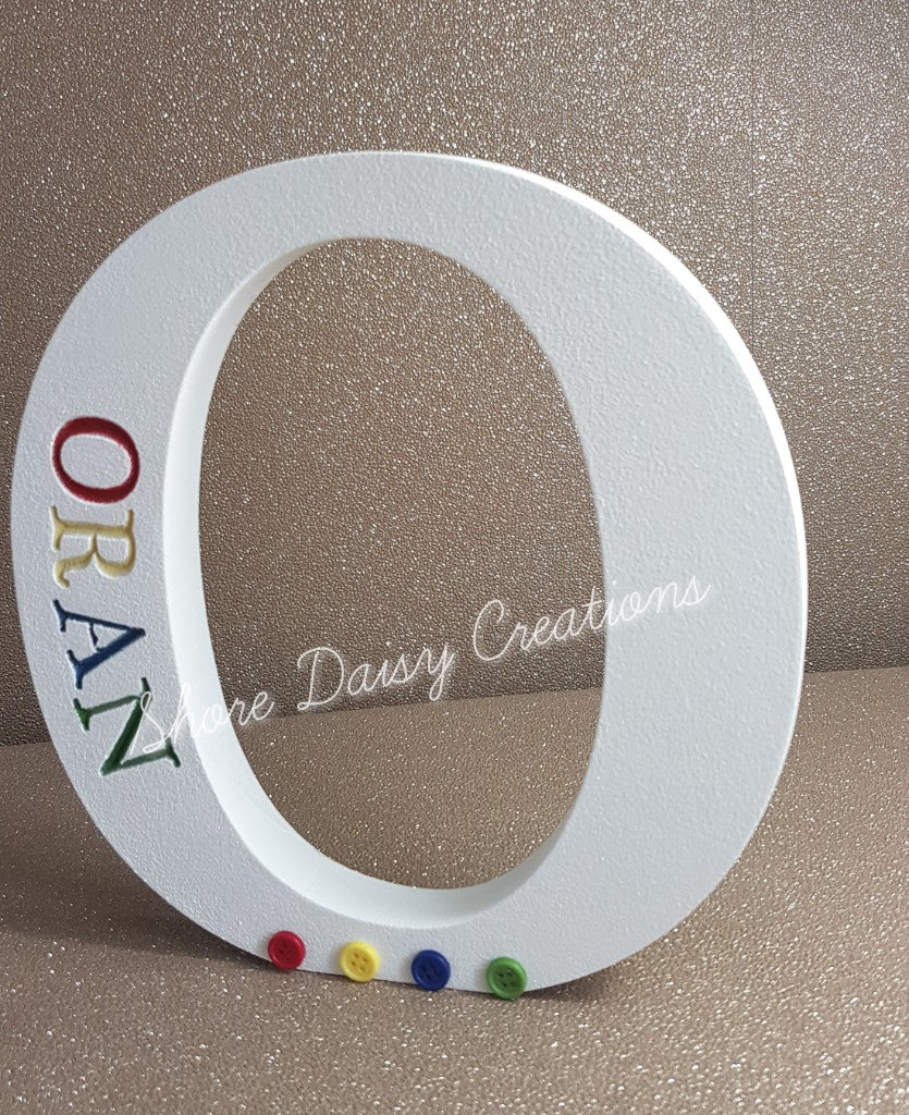 wooden rainbow letter o