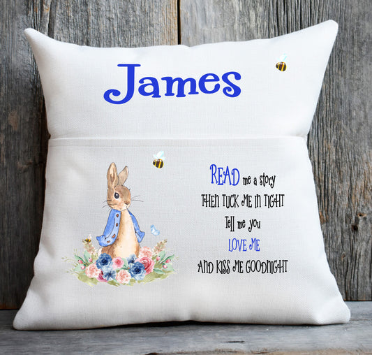 blue rabbit book cushion