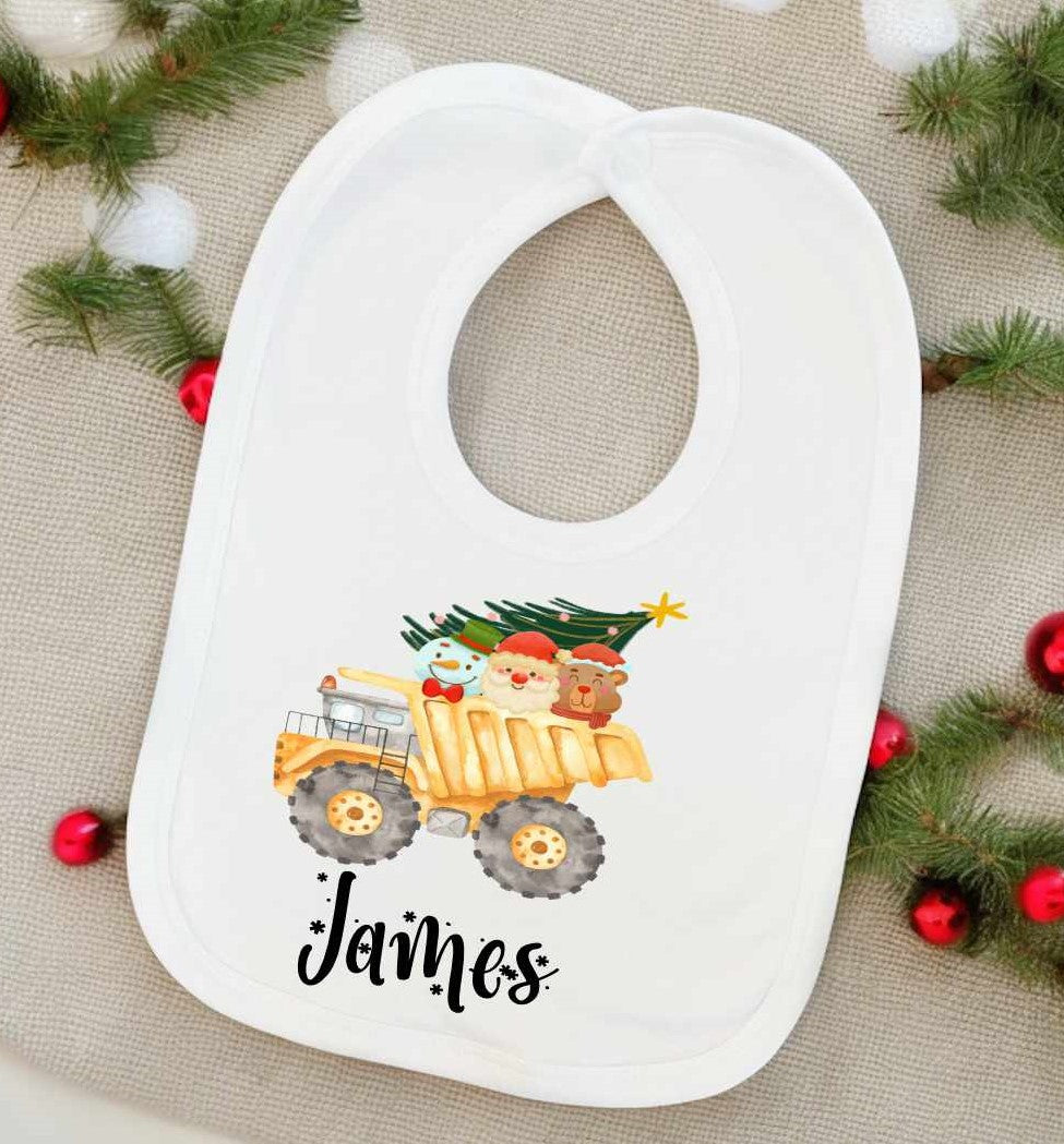baby bib with picture of yellow dump truck with Christmas tree and Christmas characters