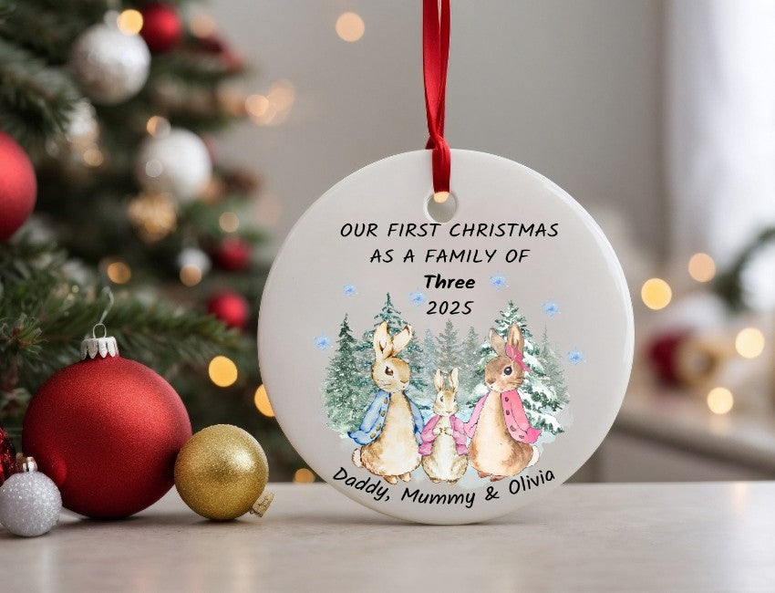 Personalised Christmas ornament with family of three and festive background