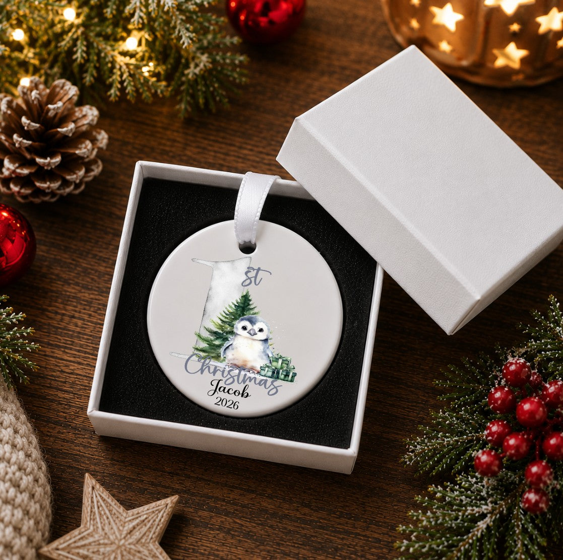 A personalised round Christmas ornament in a white gift box, featuring a printed illustration of an owl and the text '1St. Christmas Jacob 2026', 