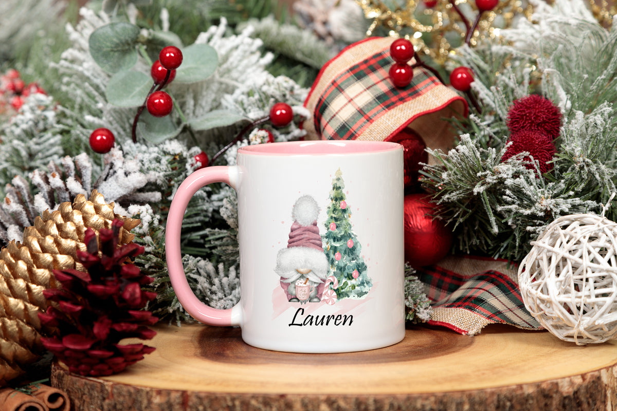 pink Christmas mug with picture of gonk and Christmas tree