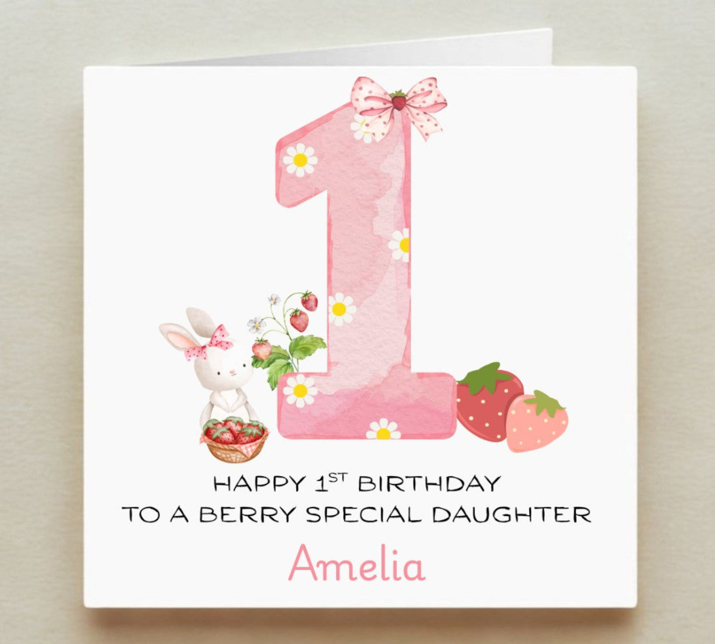 Birthday card with a pink number '1', bunny, and strawberries on a white background