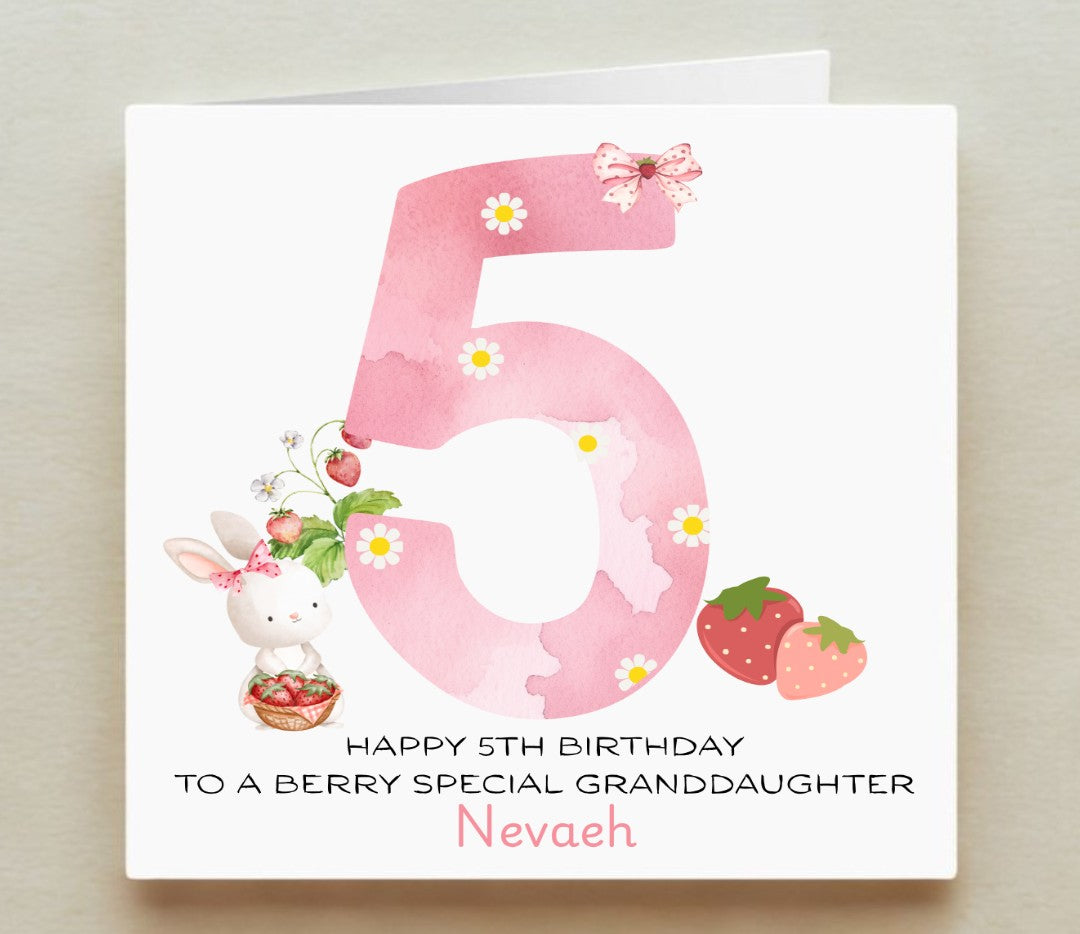 Birthday card with a pink number '5', rabbit, and strawberries on a white background