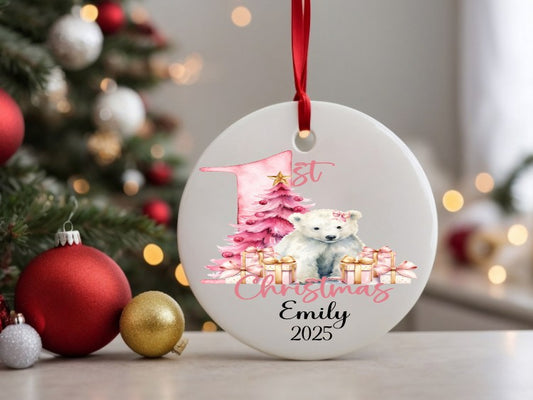 Christmas ornament with a bear and tree design, featuring the text '1st Christmas Emily 2025', surrounded by festive decorations.