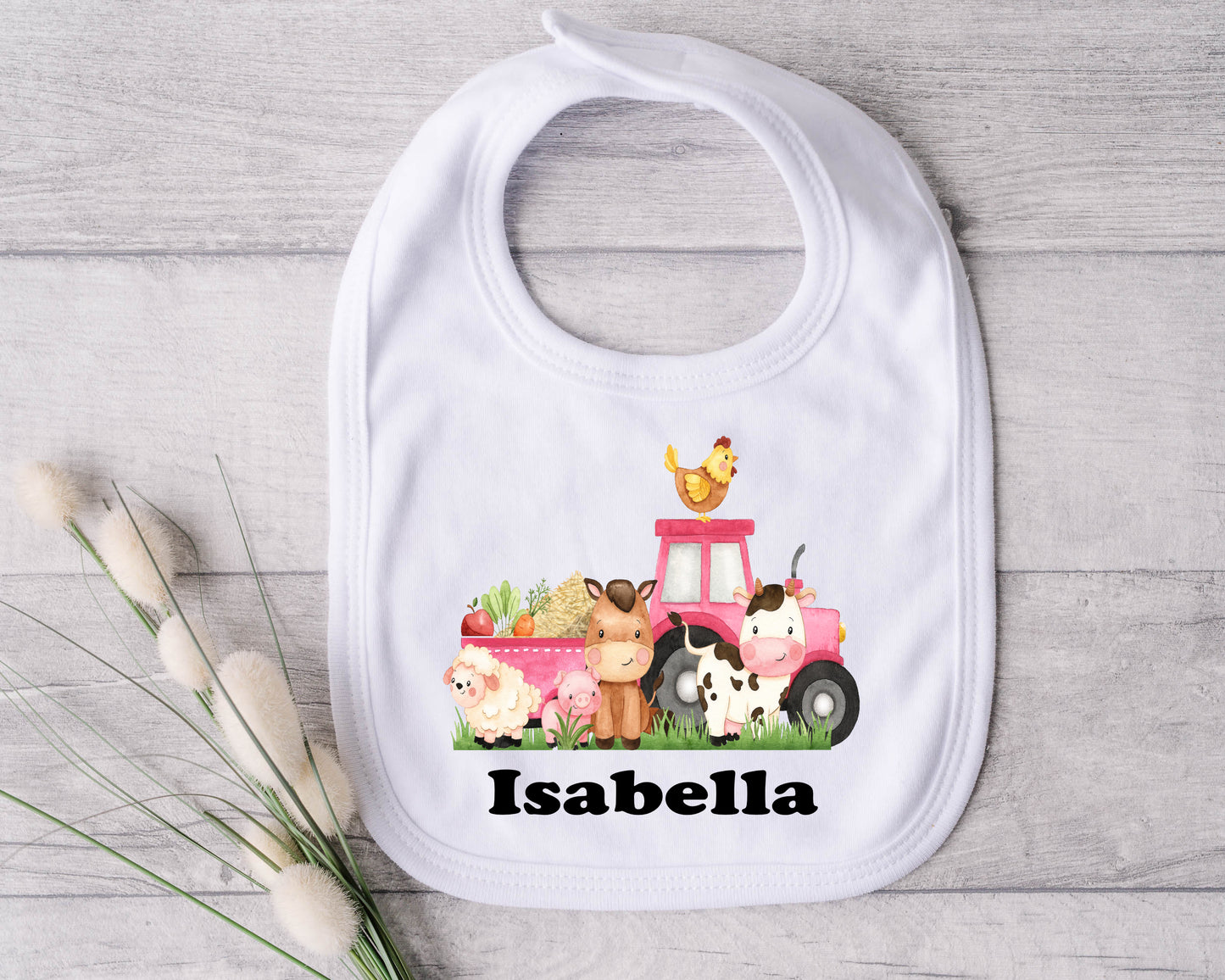 pink tractor bib